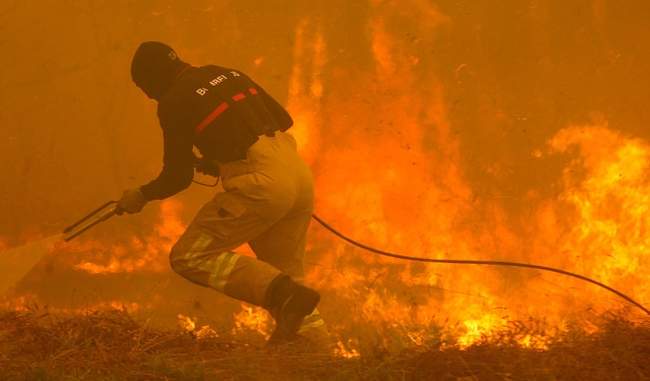Deadly wildfires rage across Portugal and Spain