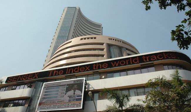 Sensex at record close, Nifty ends above 9,800 for 1st time; RIL at new 9-year high