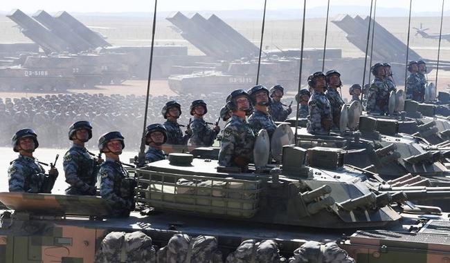 Xi Calls for Strong Army, Tells China Troops 'World Isn't Safe'