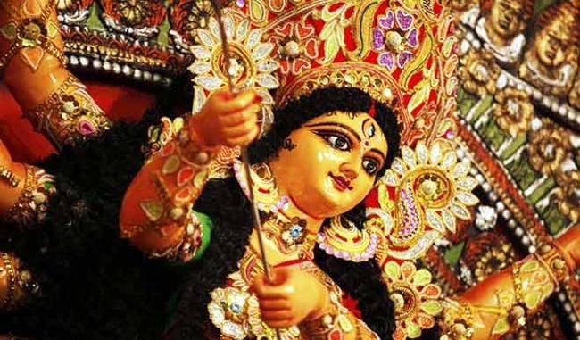 2 Kolkata Durga puja committees choose gold to deck up deities