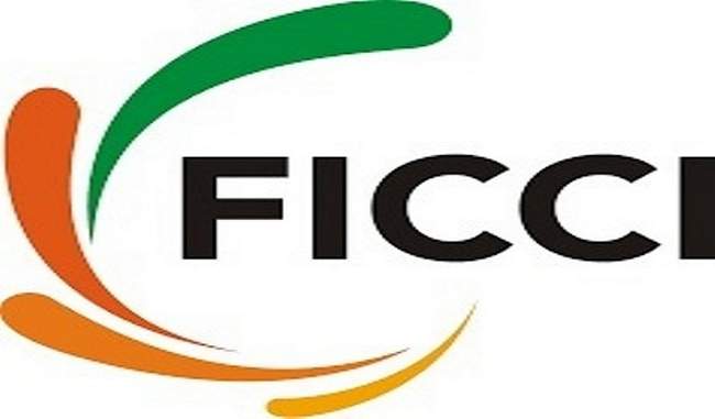 FICCI demands reduction in corporate tax to 28 percent