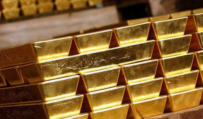 Gold down by Rs 120 on weak global trend
