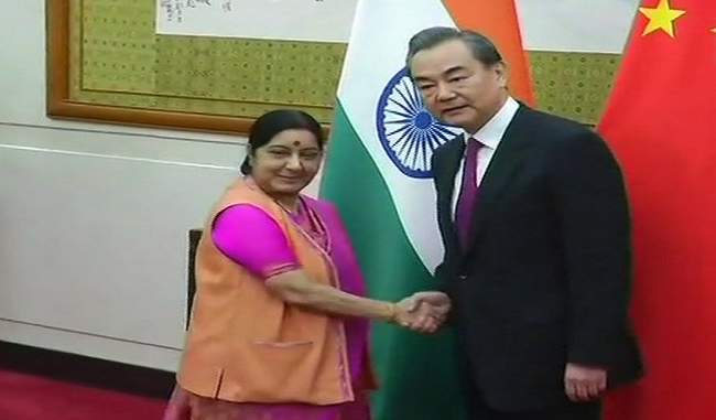 Sushma meets Wang to discuss India-China relations