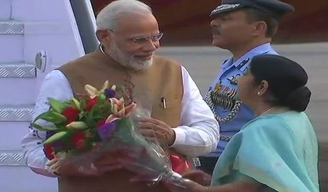 Prime Minister Narendra Modi returns home after two-day visit to China