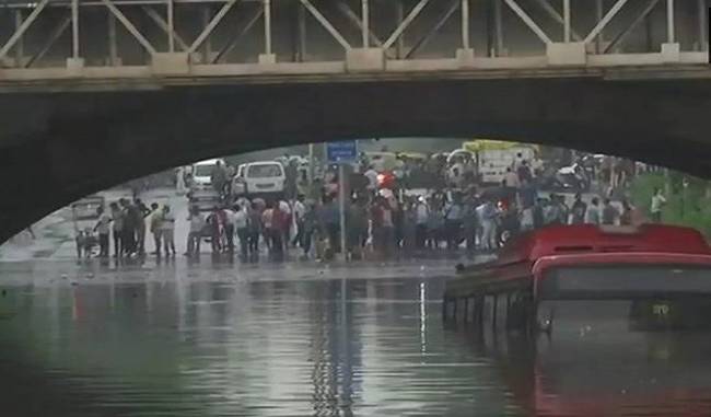 Delhi rain: DTC bus submerged under Minto Road Bridge