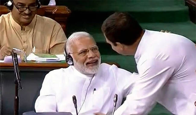rahul gandhi gives jadu ki jhappi to prime minister modi