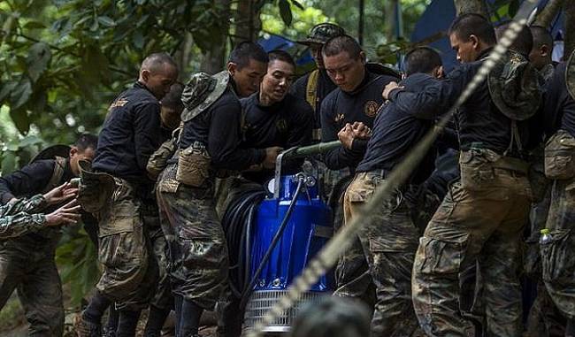 Over hundred chimneys drilled into mountain in bid to reach trapped Thai boys