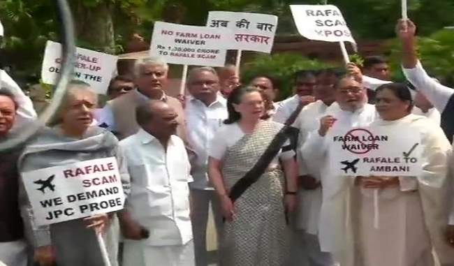 protest-by-sonia-gandhi-and-opposition-in-parliament-premises-over-rafaledeal