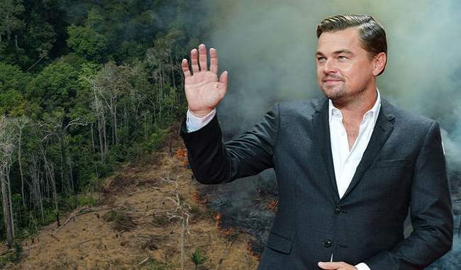 is-leonardo-dicaprio-s-hand-behind-the-blazing-fire-in-the-amazon-jungles