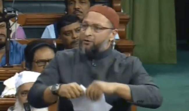 asaduddin-owaisi-tears-copy-of-citizenship-amendment-bill-in-lok-sabha