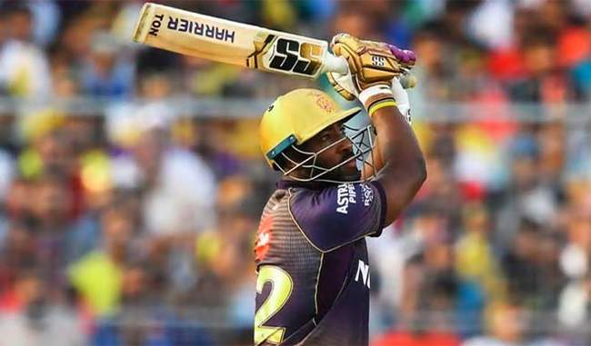 russell-stars-as-kkr-beat-mi-to-keep-playoffs-hopes-alive