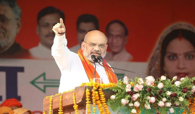 this-fight-is-between-the-congress-and-bjp-s-three-g-says-amit-shah