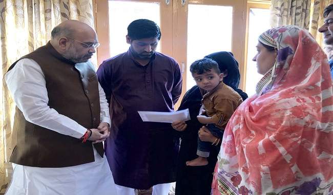 amit-shah-lauds-j-and-k-cops-hands-over-appointment-letter-to-anantnag-martyr-arshad-khans-wife