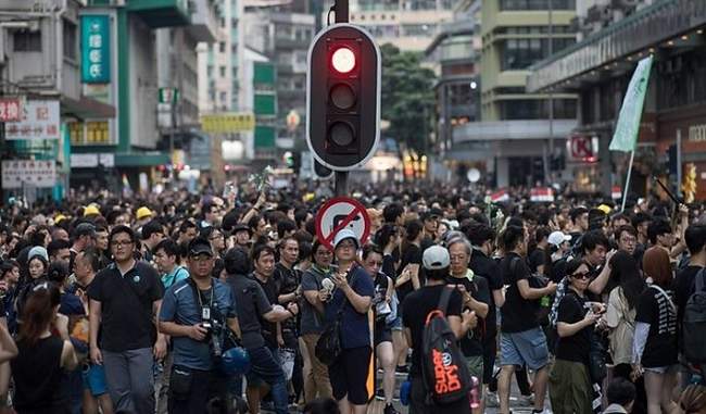 hong-kong-hundreds-of-thousands-join-protest-in-pouring-rain
