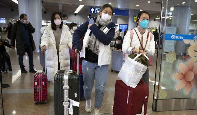 कोरोना वायरस के फैलने के डर से चीन ने 13 शहरों में लगाया यात्रा प्रतिबंध
