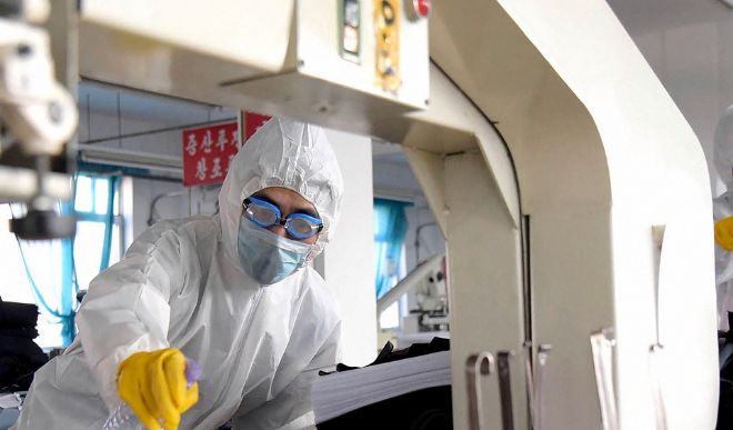 गुप्त रूप से कोरोना वायरस के स्रोत का पता लगाने की कोशिशों को रोकने में जुटा चीन