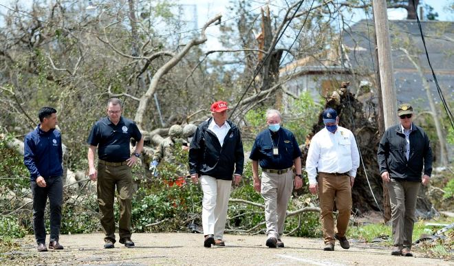 Trump visits the hurricane-hit Texas and Louisiana states