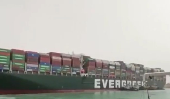 Giant ship stuck in Suez Canal for fifth day Giant ship stuck in Suez Canal for fifth day
