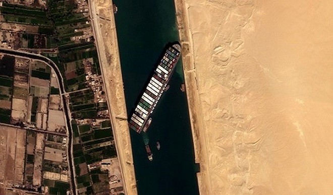 Container ship stranded in Suez Canal re-floated