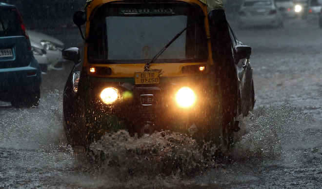 Rain inundates Delhi,