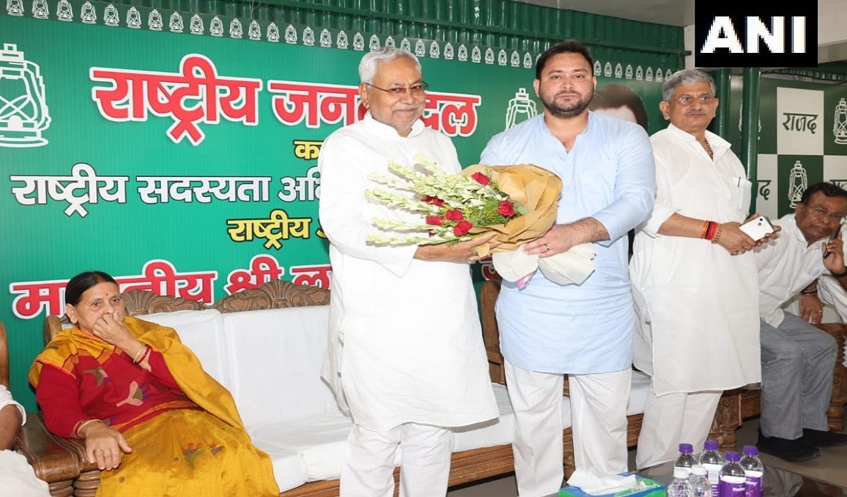 Nitish Kumar along with RJD leader Tejashwi Yadav