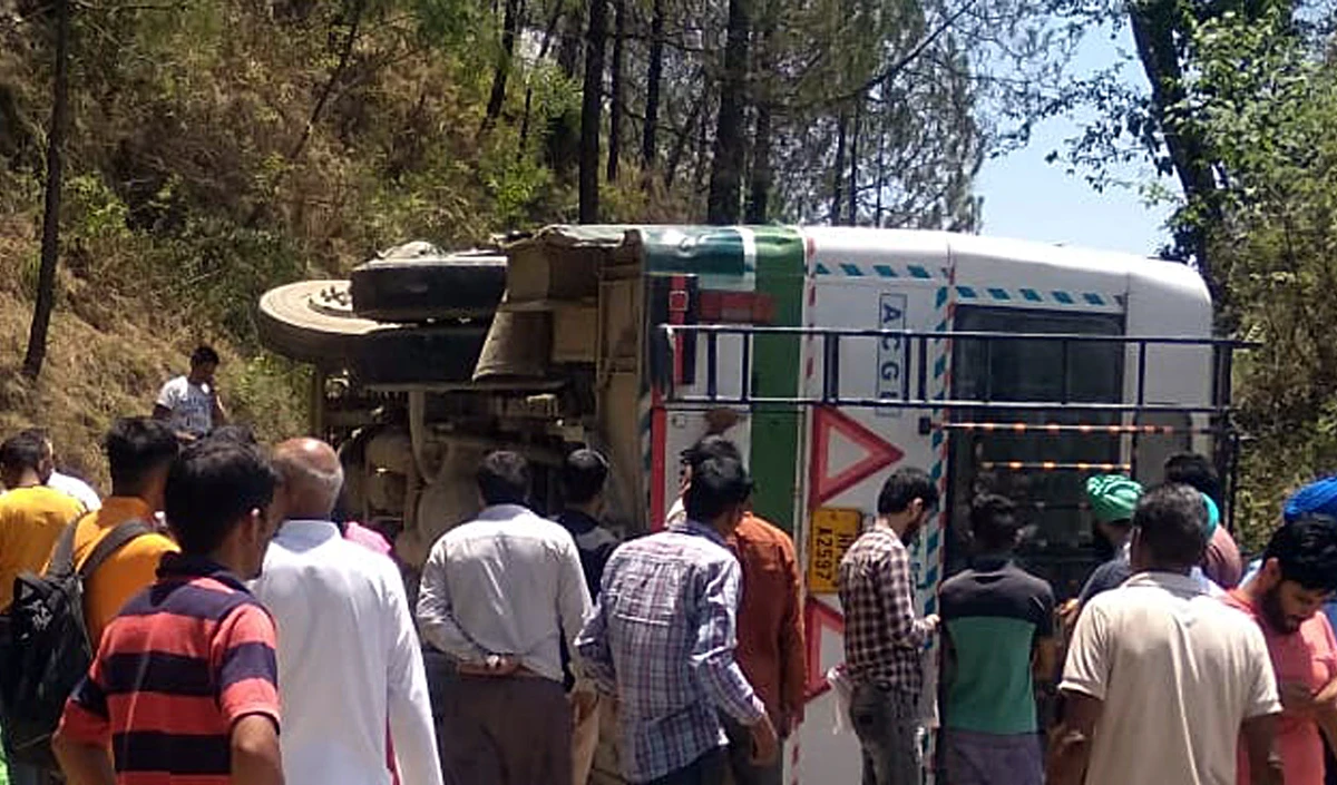 Bus overturns