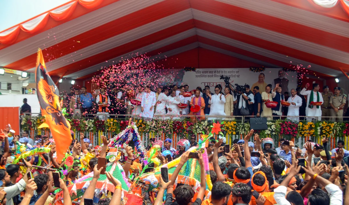 CM Yogi Showers flowers on Kanwariyas